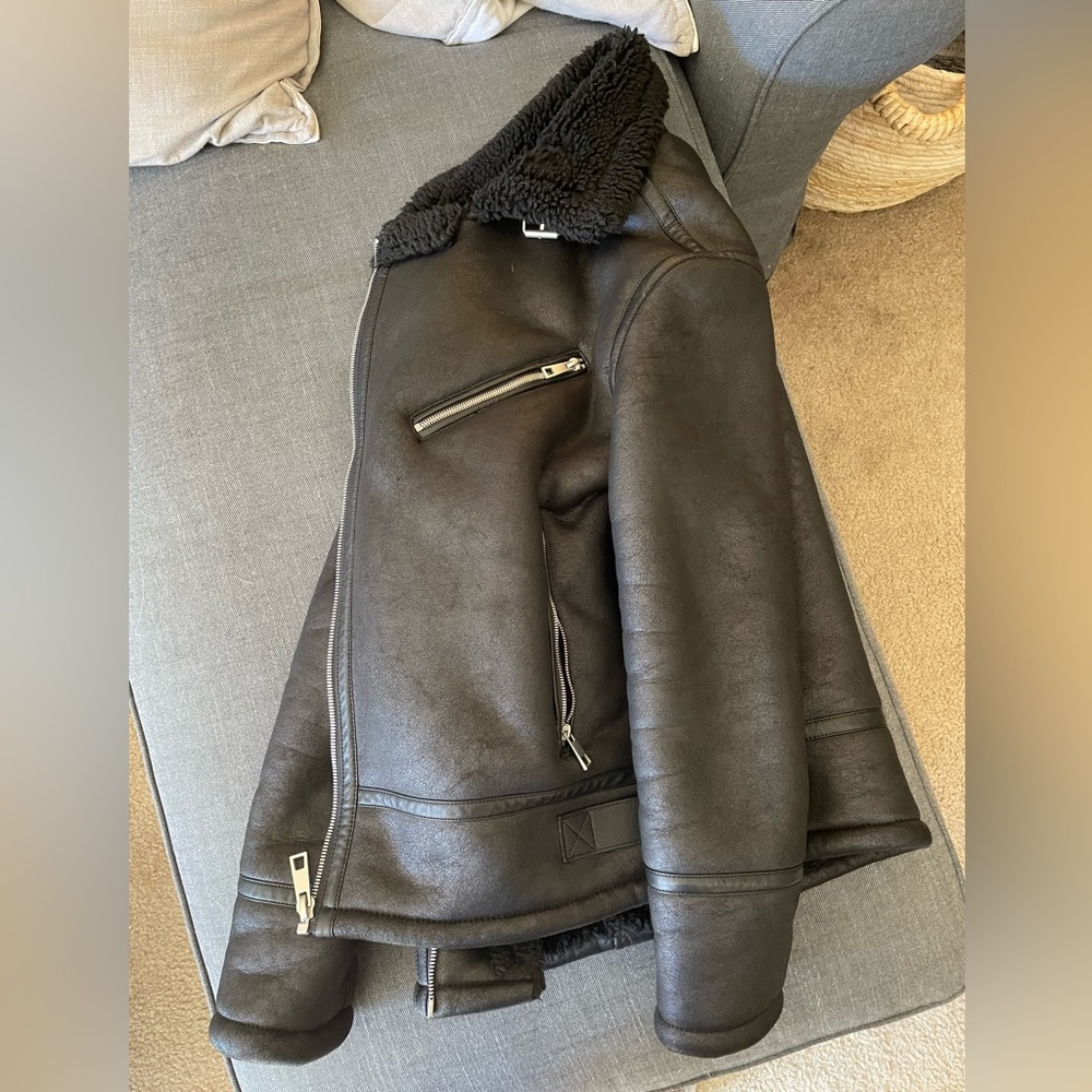 Nice jacket, brand unknown. Size M/L. Warm with inner lining. Stylish.